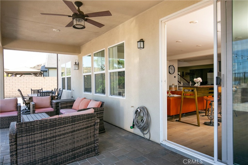 19680 Griffith Drive Saugus, CA 91350 - Photo 25 of 49 a living room with furniture and large windows