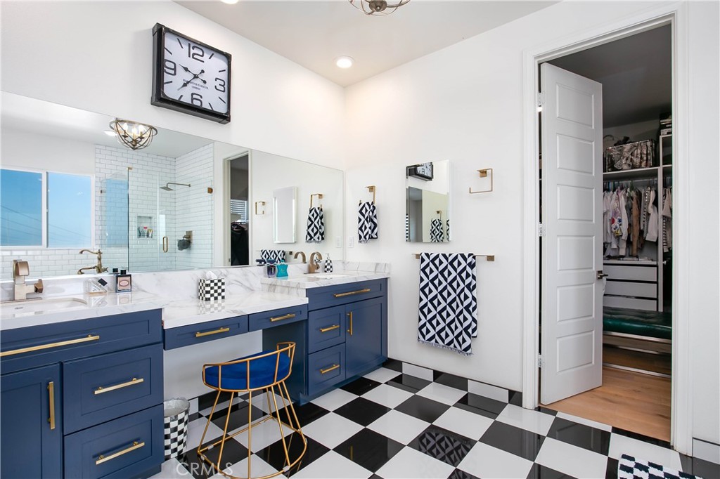 19680 Griffith Drive Saugus, CA 91350 - Photo 5 of 49 a room with a sink a washer and dryer