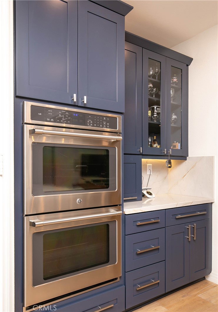 19680 Griffith Drive Saugus, CA 91350 - Photo 7 of 49 a stove top oven sitting inside of a kitchen