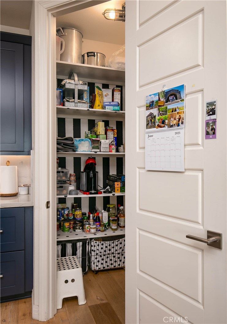 19680 Griffith Drive Saugus, CA 91350 - Photo 8 of 49 a kitchen with a refrigerator and cabinets