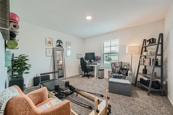 a living room with furniture or couch and a flat screen tv
