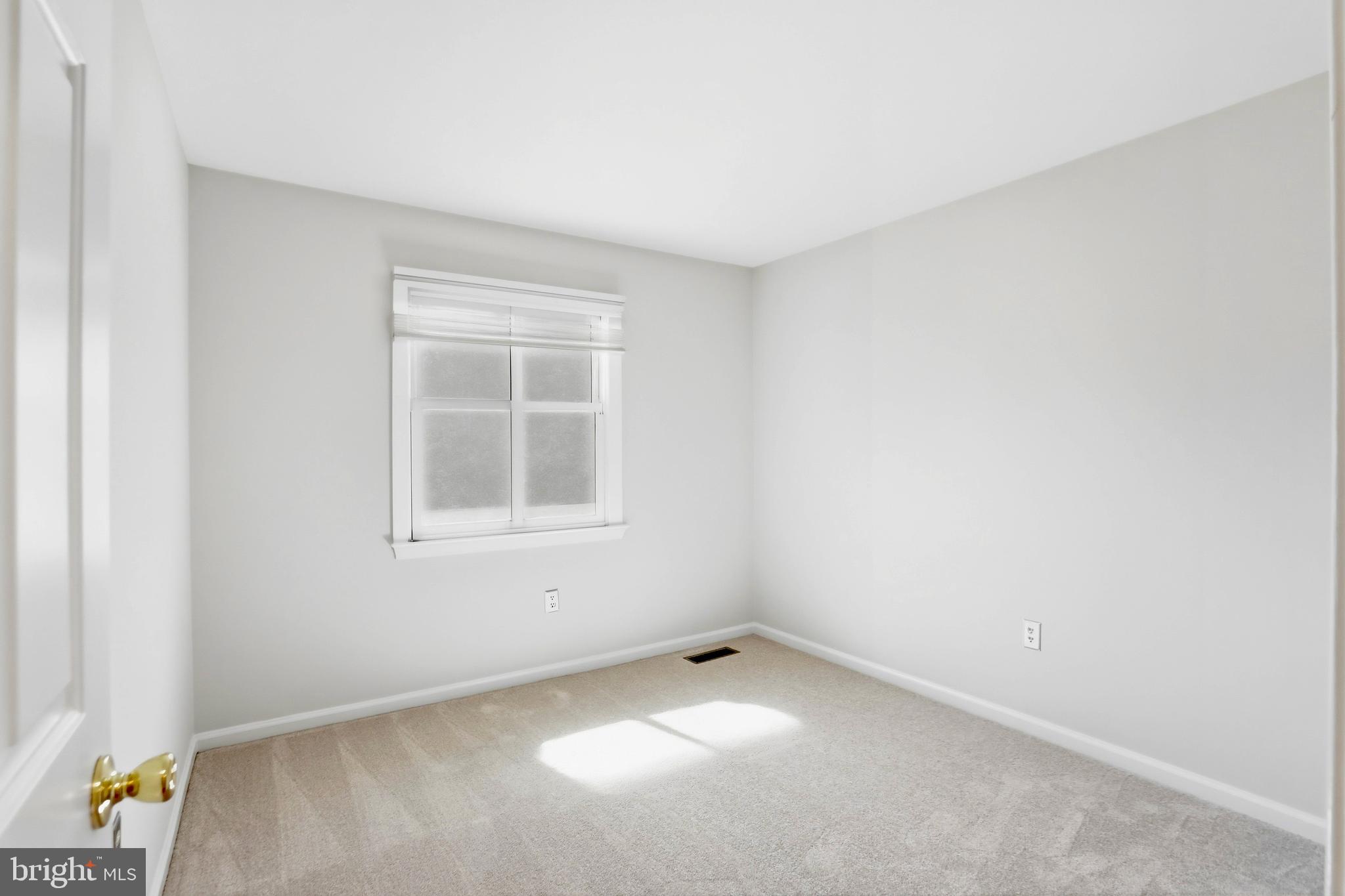 9202 Rockefeller Lane Springfield, VA 22153 - Photo 25 of 38 an empty room with a window