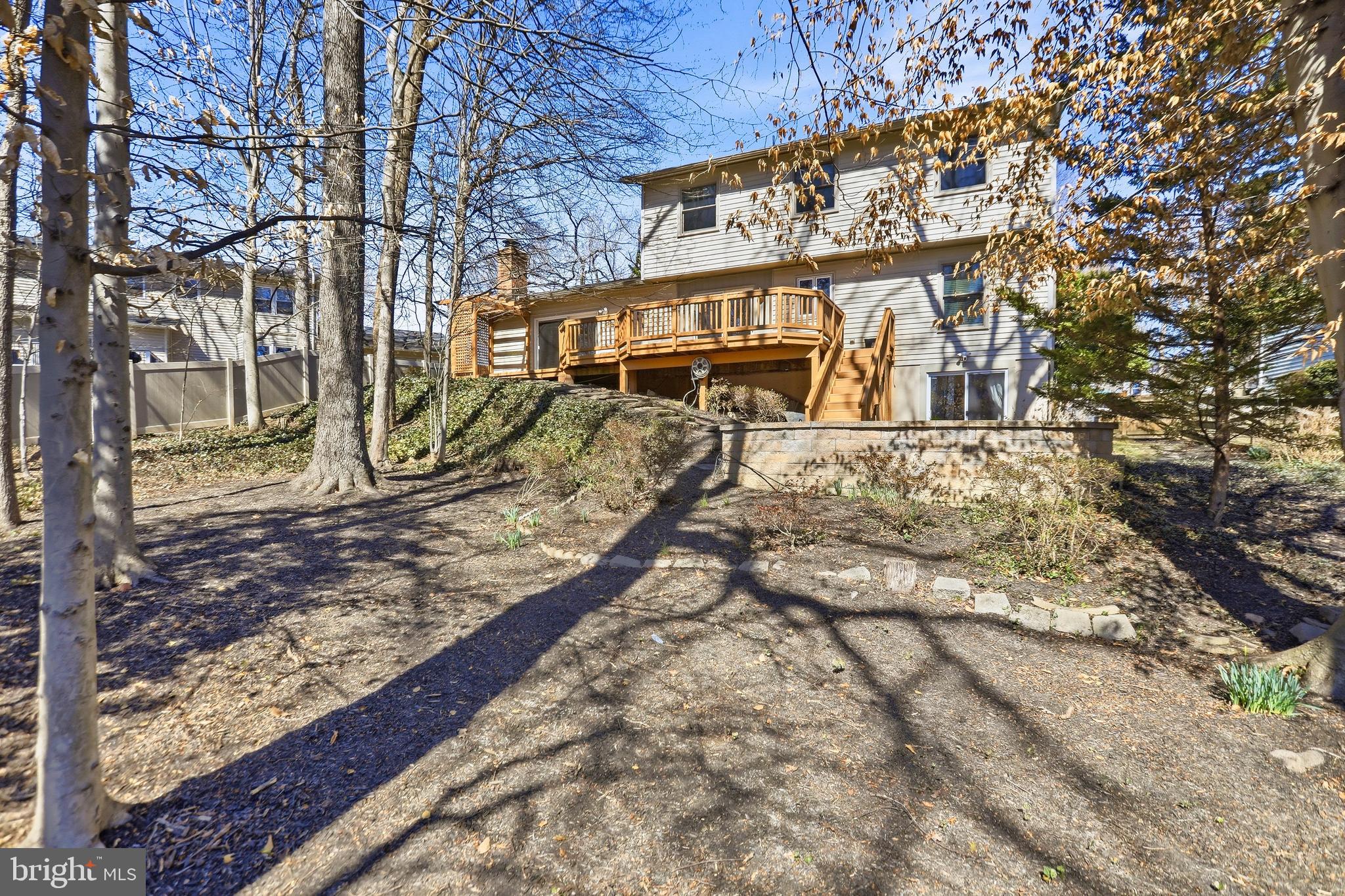 9202 Rockefeller Lane Springfield, VA 22153 - Photo 32 of 38 a view of a house with a yard