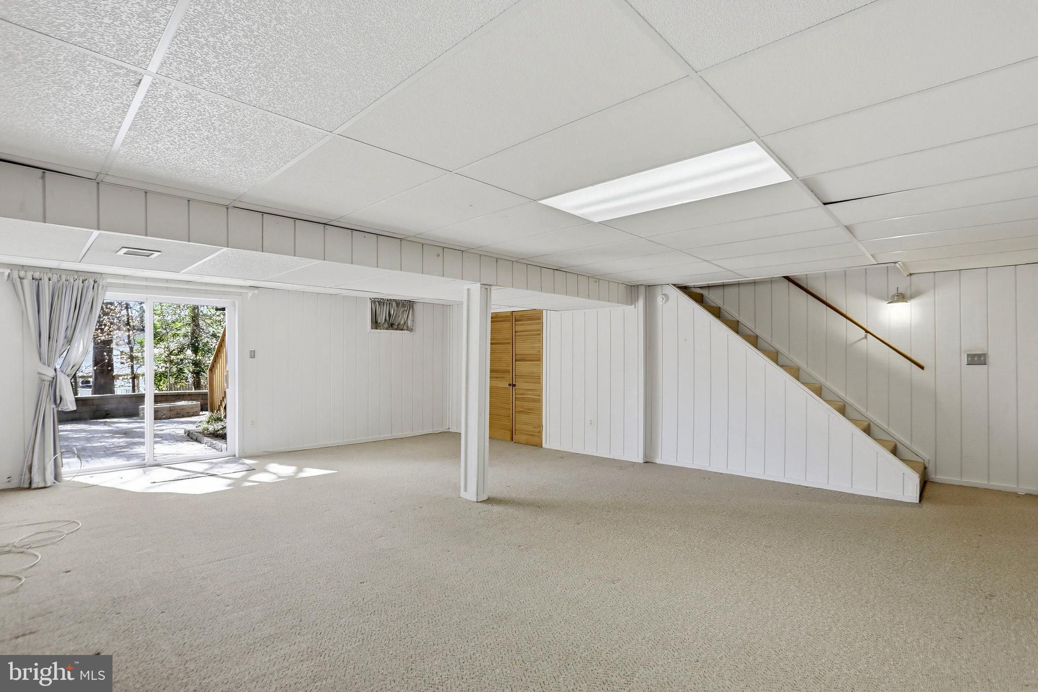 9202 Rockefeller Lane Springfield, VA 22153 - Photo 4 of 38 a view of an empty room with windows