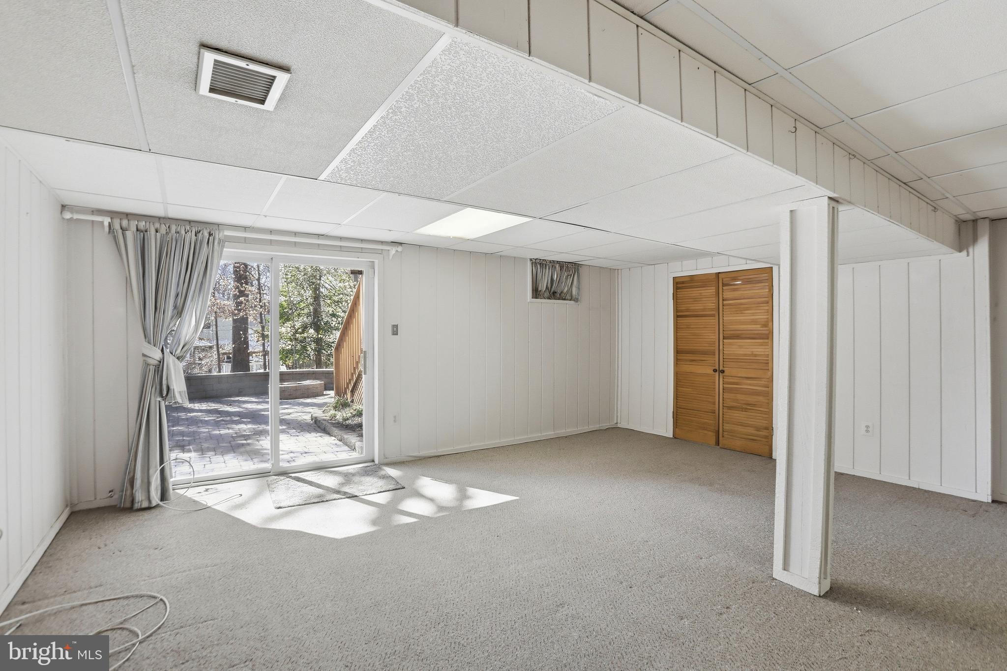 9202 Rockefeller Lane Springfield, VA 22153 - Photo 5 of 38 a view of empty room with floor to ceiling window