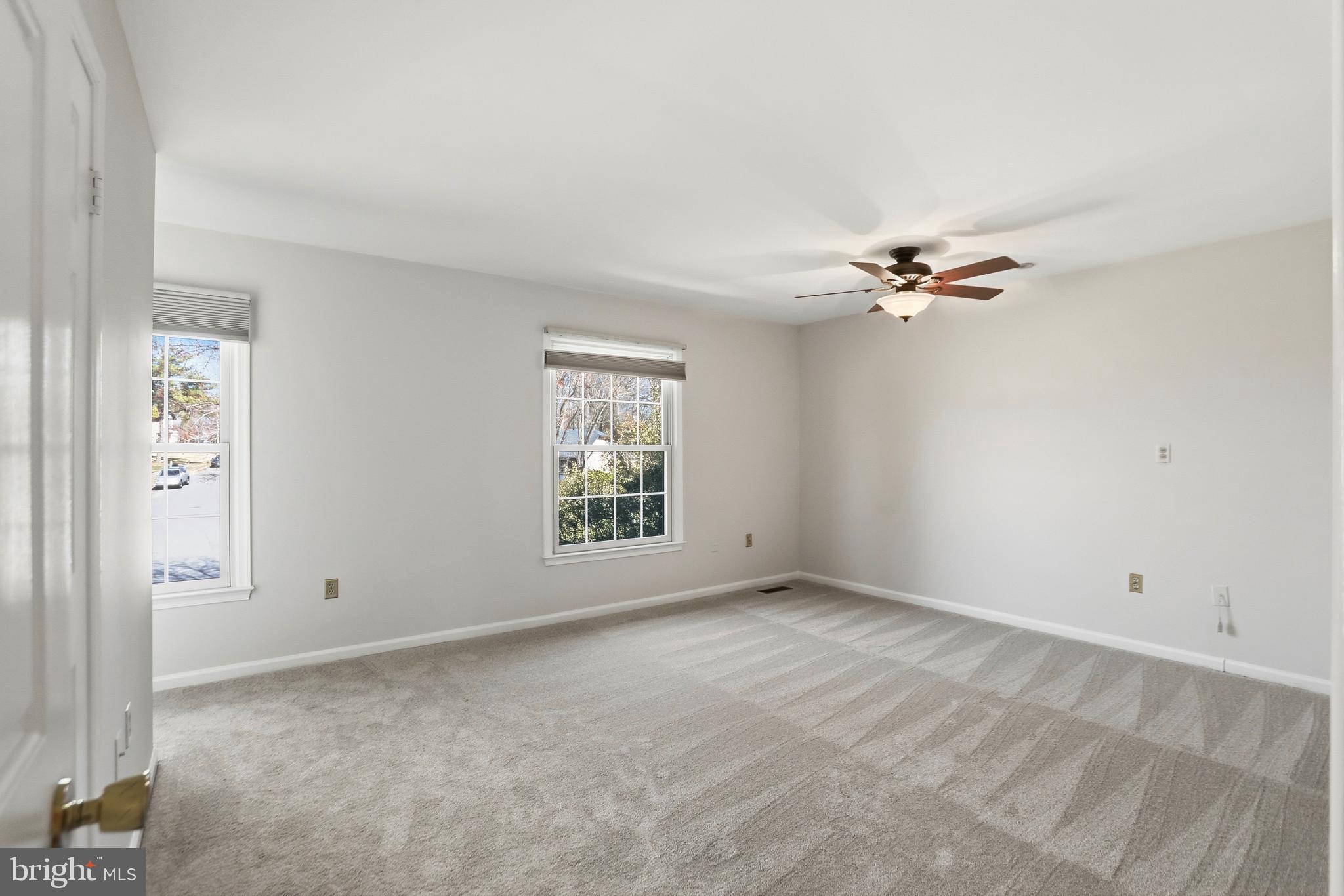 9202 Rockefeller Lane Springfield, VA 22153 - Photo 6 of 38 a view of an empty room with a window