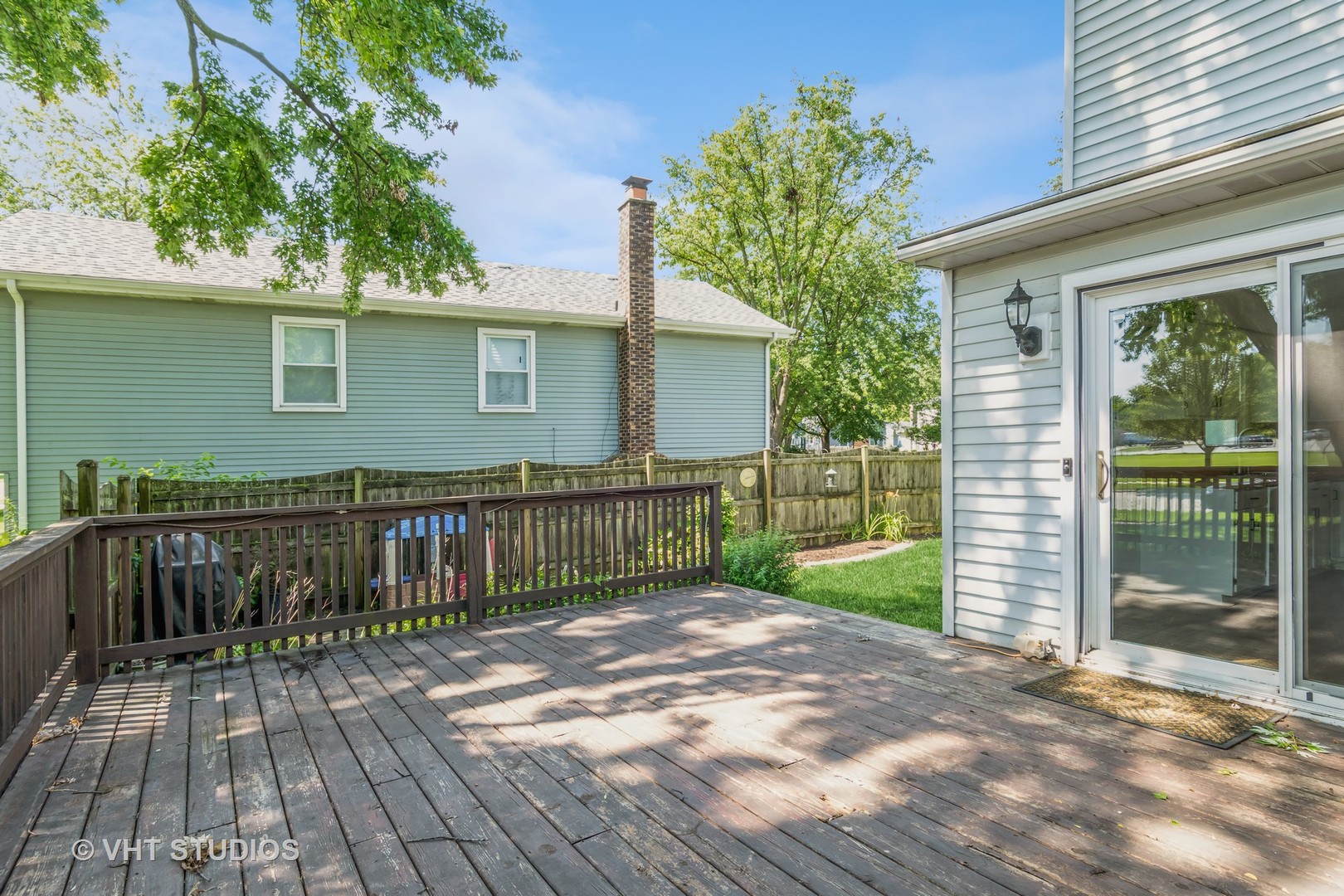 76 West Bailey Road Naperville, IL 60565 - Photo 17 of 20 a view of a house with a porch