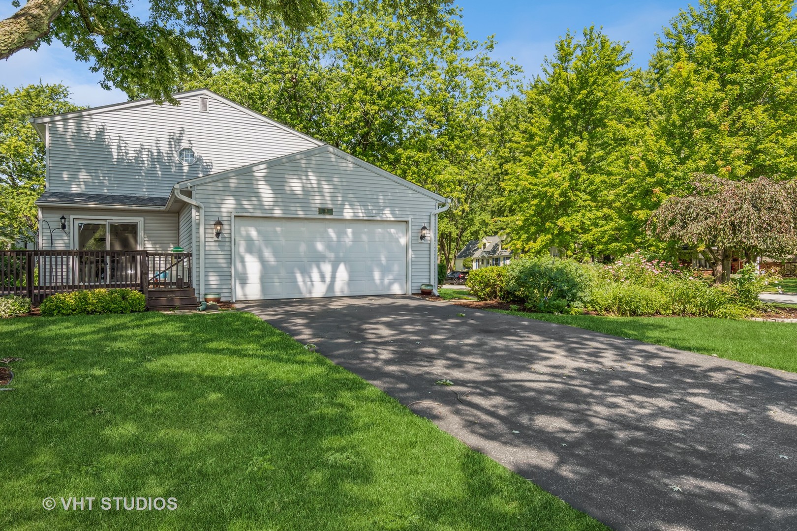 76 West Bailey Road Naperville, IL 60565 - Photo 18 of 20 a view of a house with a yard