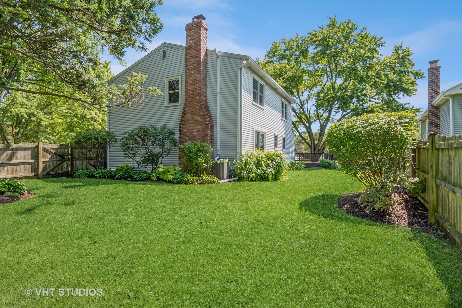 76 West Bailey Road Naperville, IL 60565 - Photo 19 of 20 a front view of a house with garden