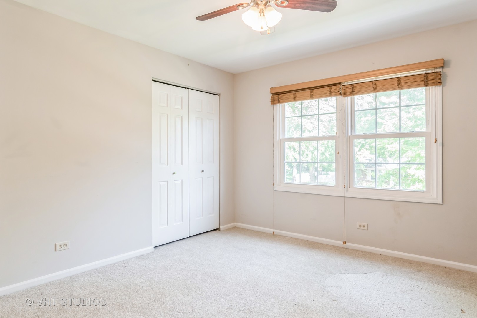 76 West Bailey Road Naperville, IL 60565 - Photo 10 of 20 an empty room with a window