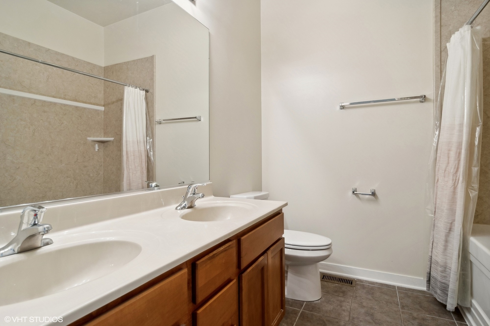 1244 West Monroe Street, Unit 7 Chicago, IL 60607 - Photo 12 of 18 a bathroom with a sink and a toilet