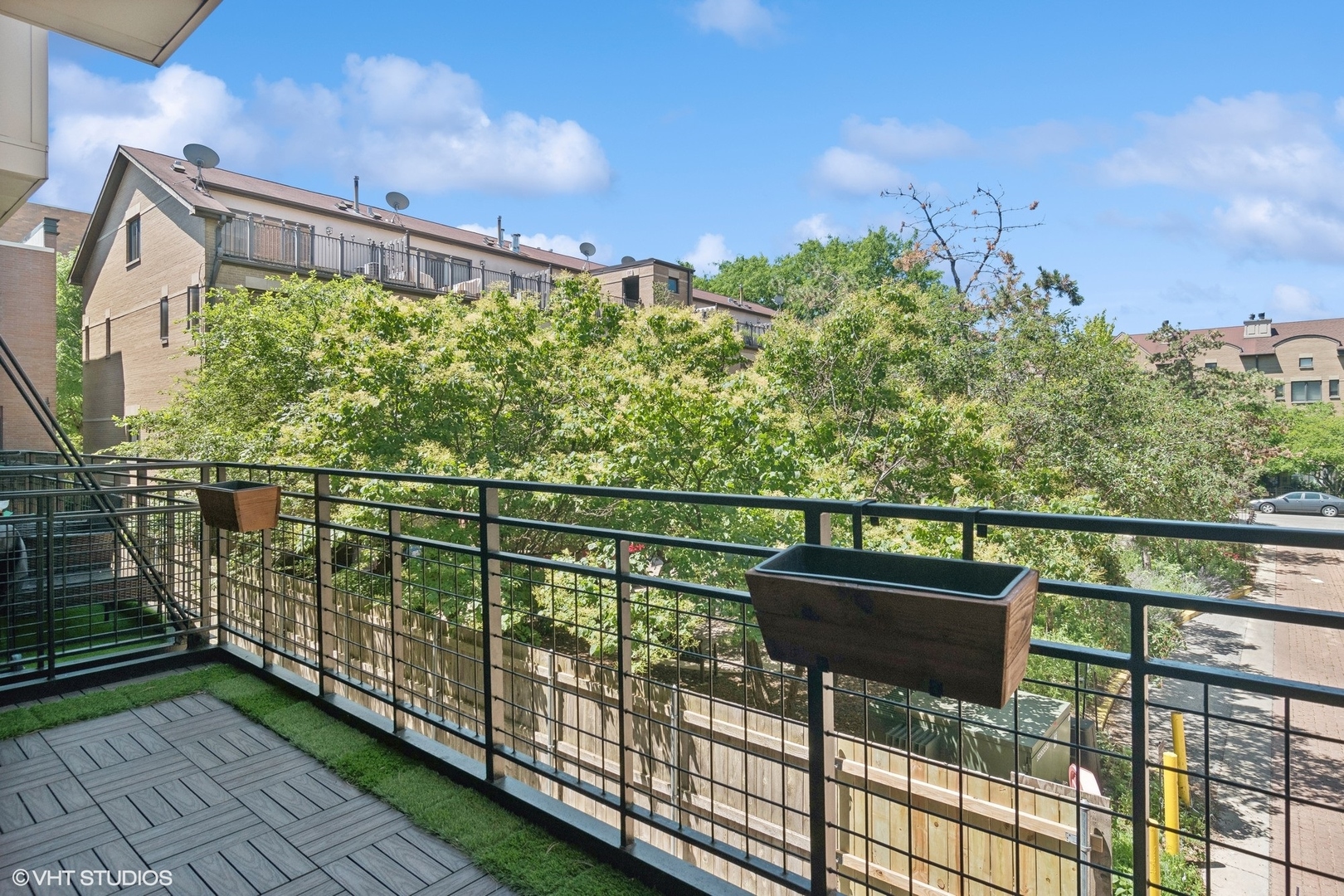 1244 West Monroe Street, Unit 7 Chicago, IL 60607 - Photo 17 of 18 a view of city from a balcony