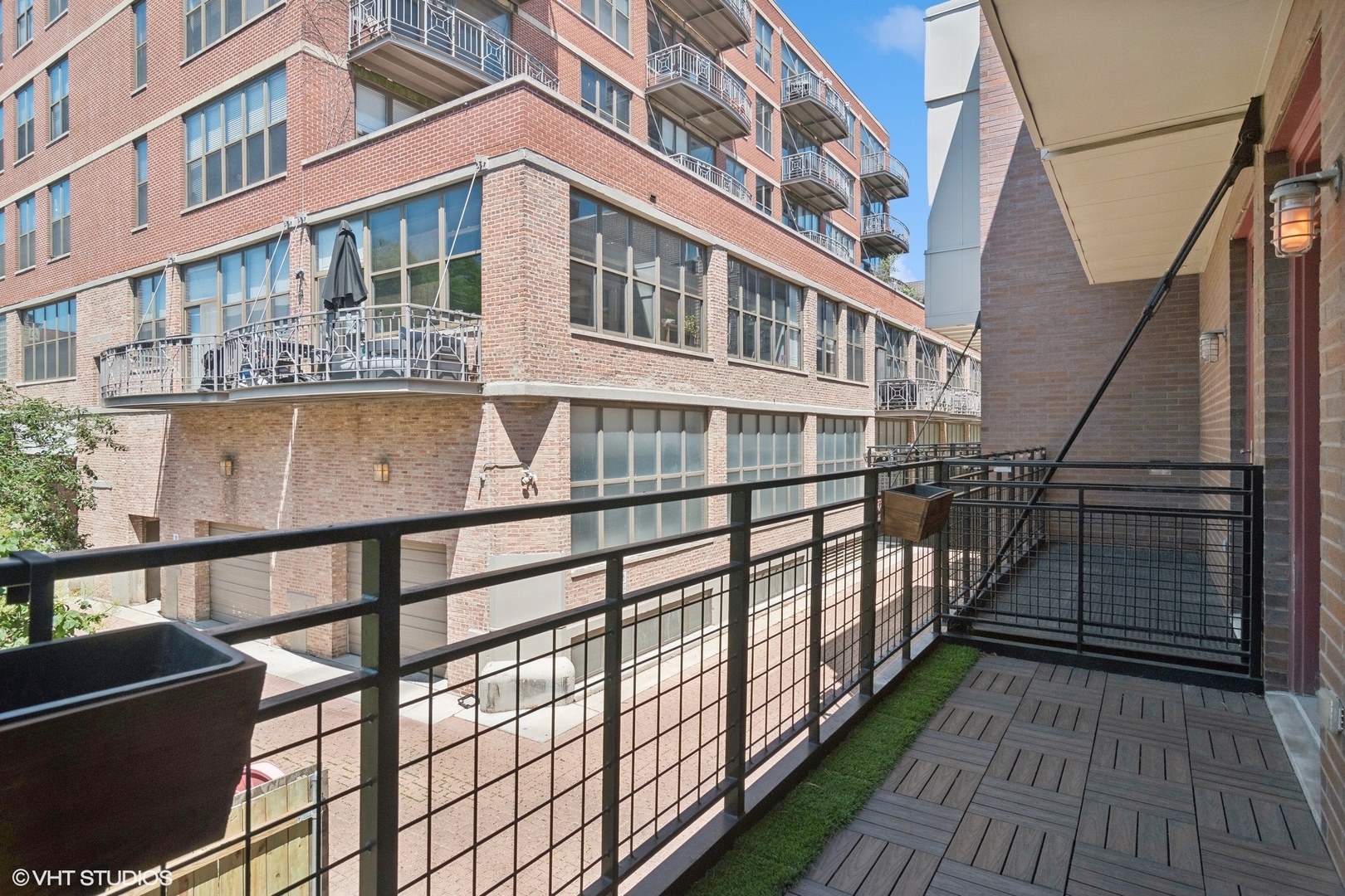 1244 West Monroe Street, Unit 7 Chicago, IL 60607 - Photo 18 of 18 a view of a building from a balcony