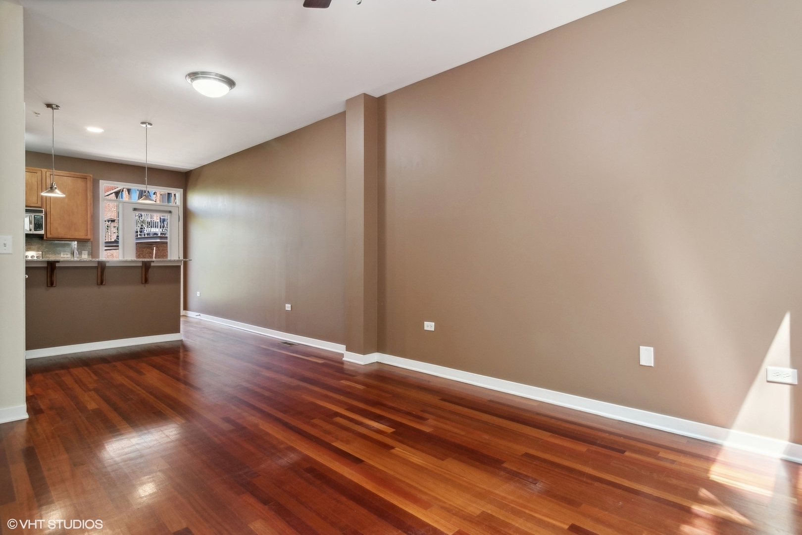 1244 West Monroe Street, Unit 7 Chicago, IL 60607 - Photo 6 of 18 a view of a livingroom with wooden floor