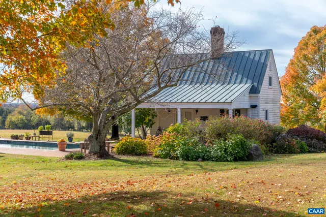 a view of a lake with a garden and lake view