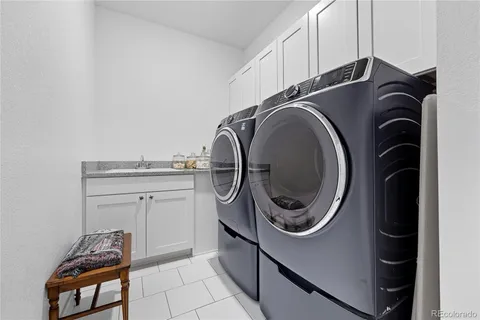 a front view of house with a garden