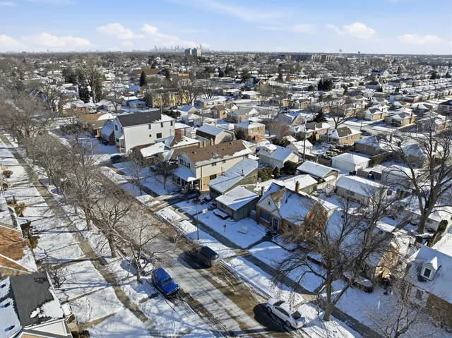 an aerial view of a city with lots of residential buildings