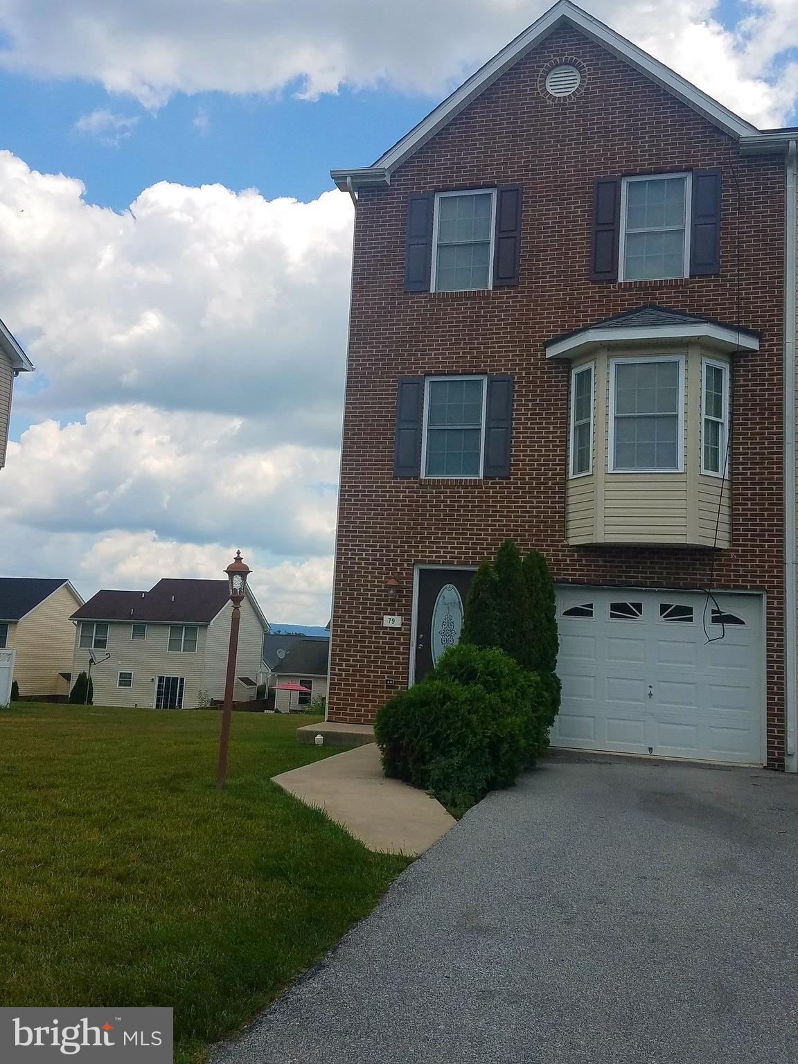 79 Fuzzy Tail Drive Ranson, WV 25438 - Photo 1 of 18 a view of a house with a yard