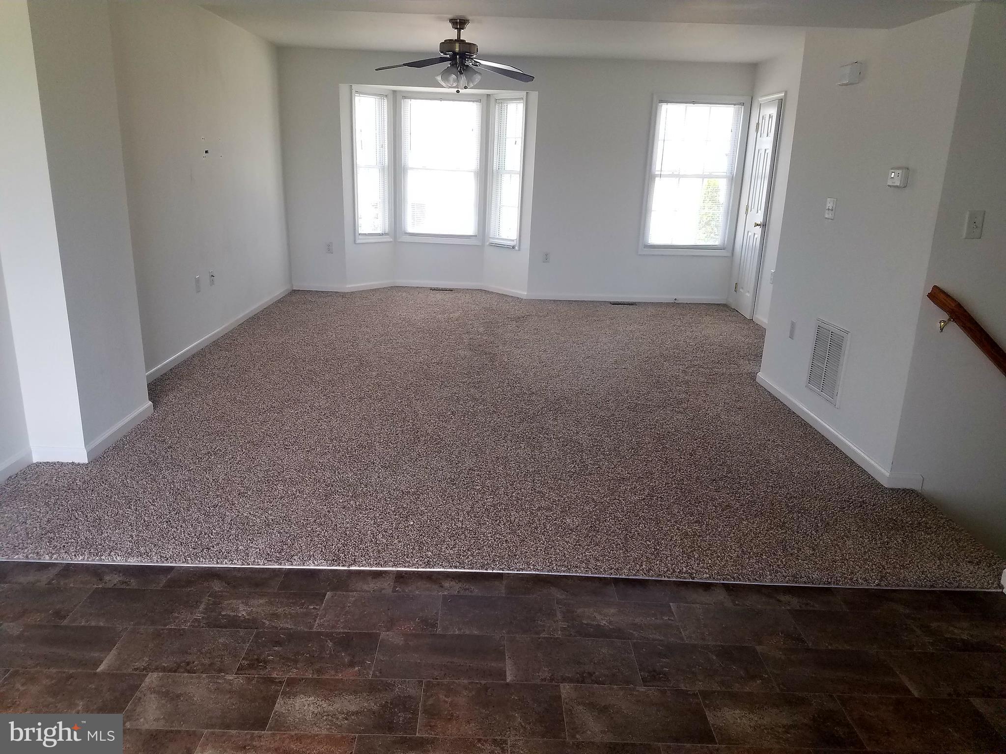 79 Fuzzy Tail Drive Ranson, WV 25438 - Photo 8 of 18 an empty room with windows