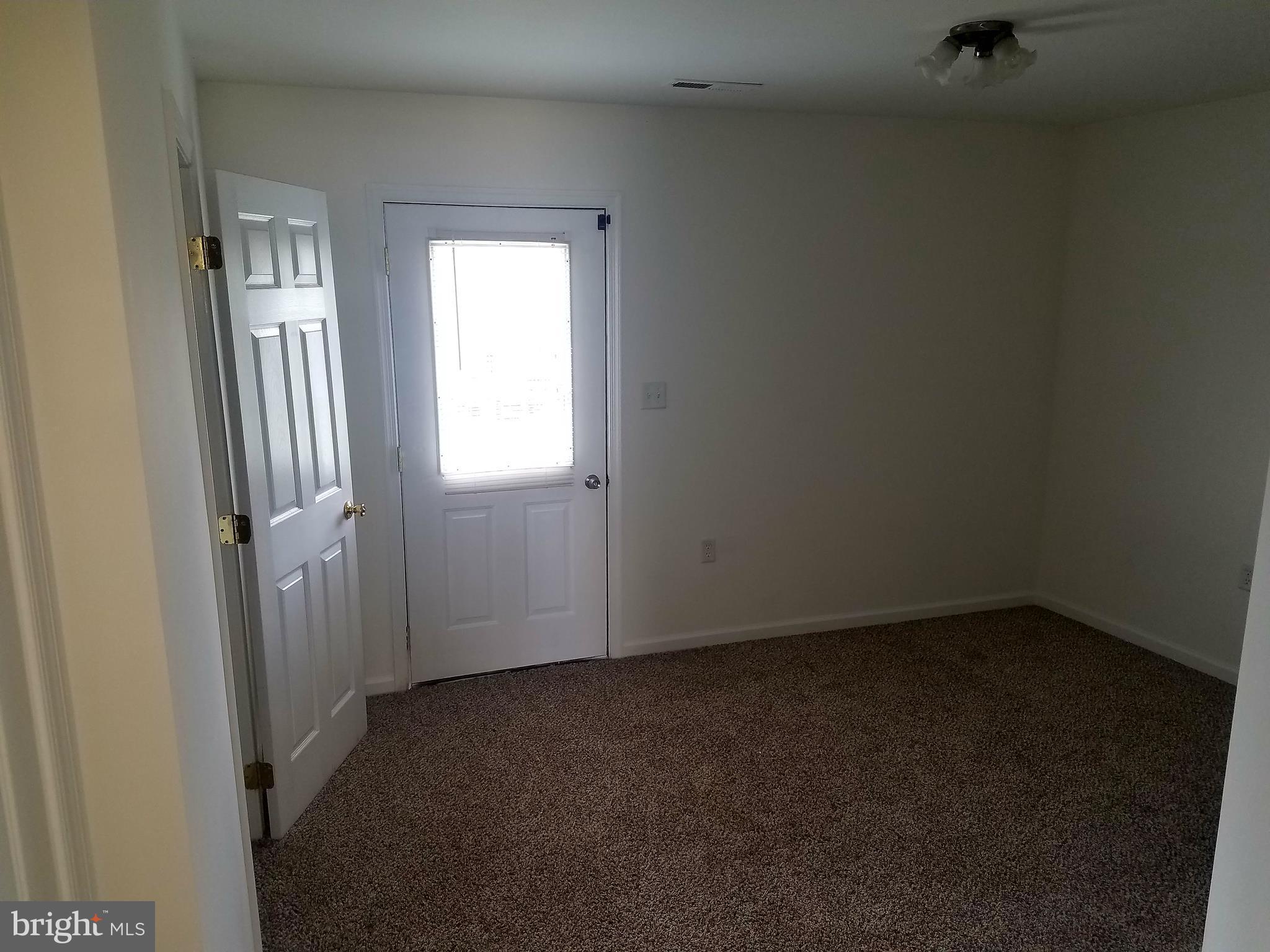 79 Fuzzy Tail Drive Ranson, WV 25438 - Photo 10 of 18 an empty room with a window