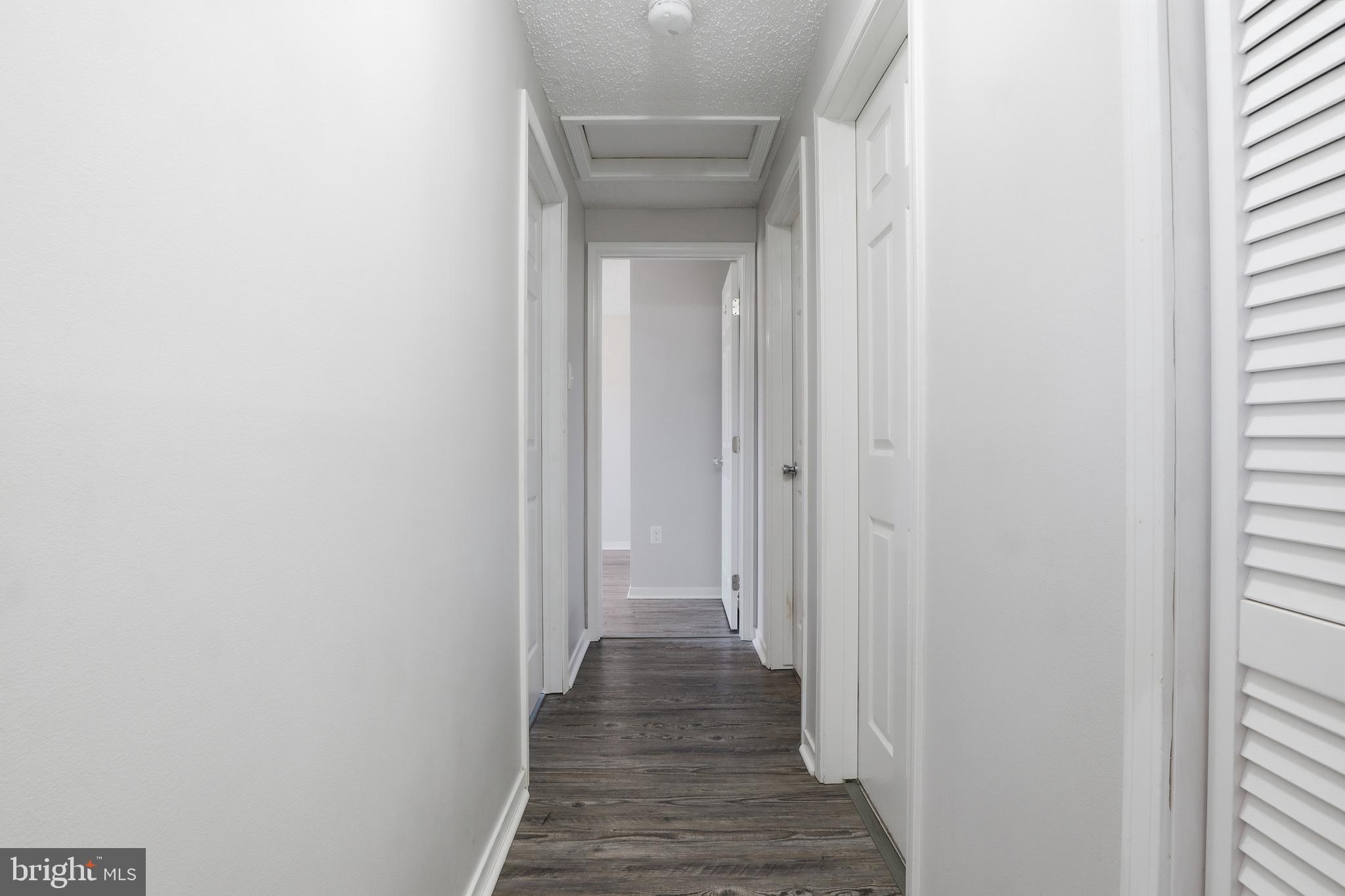 339 Lay Road Delta, PA 17314 - Photo 18 of 60 a view of a hallway with wooden floor