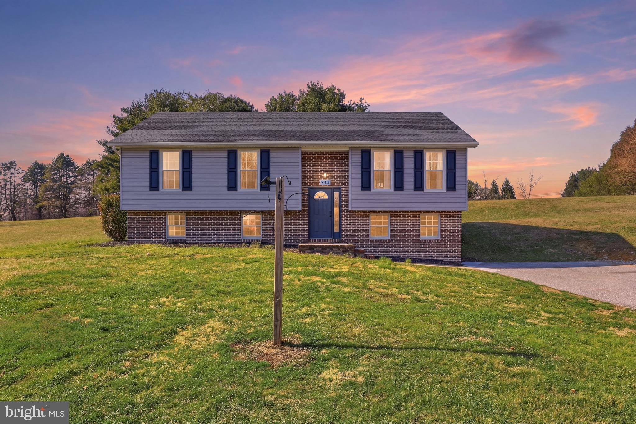 339 Lay Road Delta, PA 17314 - Photo 2 of 60 a front view of a house with garden