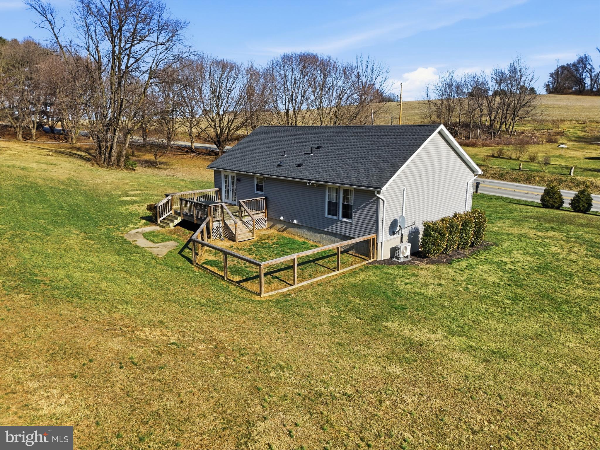 339 Lay Road Delta, PA 17314 - Photo 53 of 60 a view of a house with a yard and sitting area