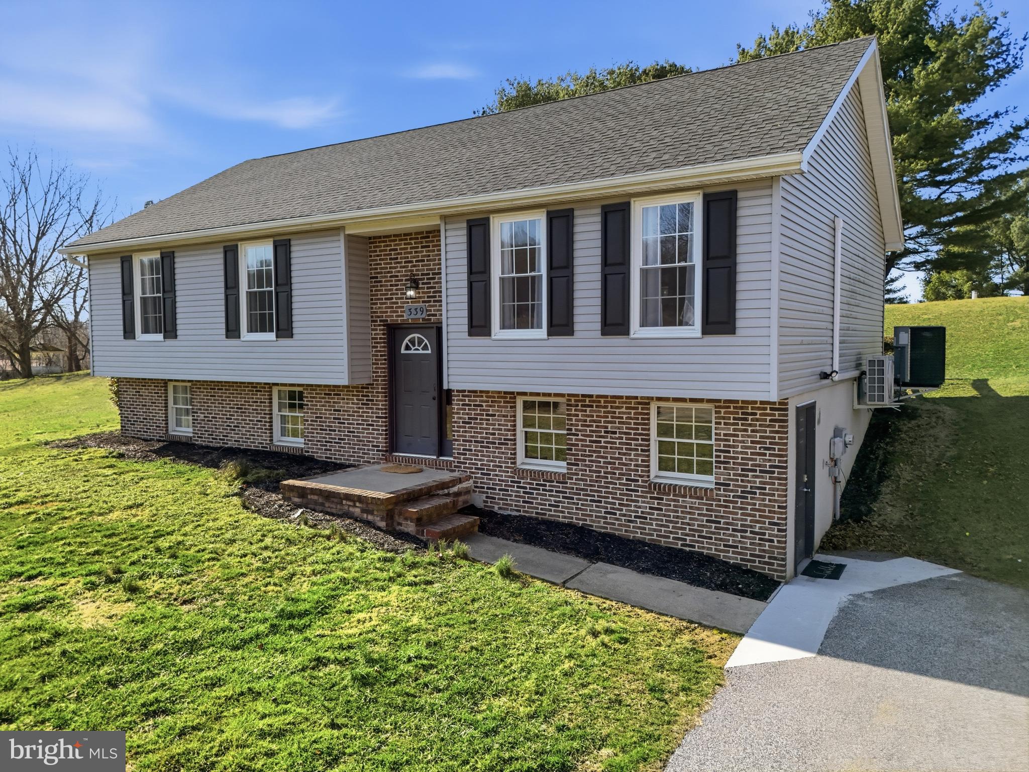 339 Lay Road Delta, PA 17314 - Photo 57 of 60 a front view of a house with a yard