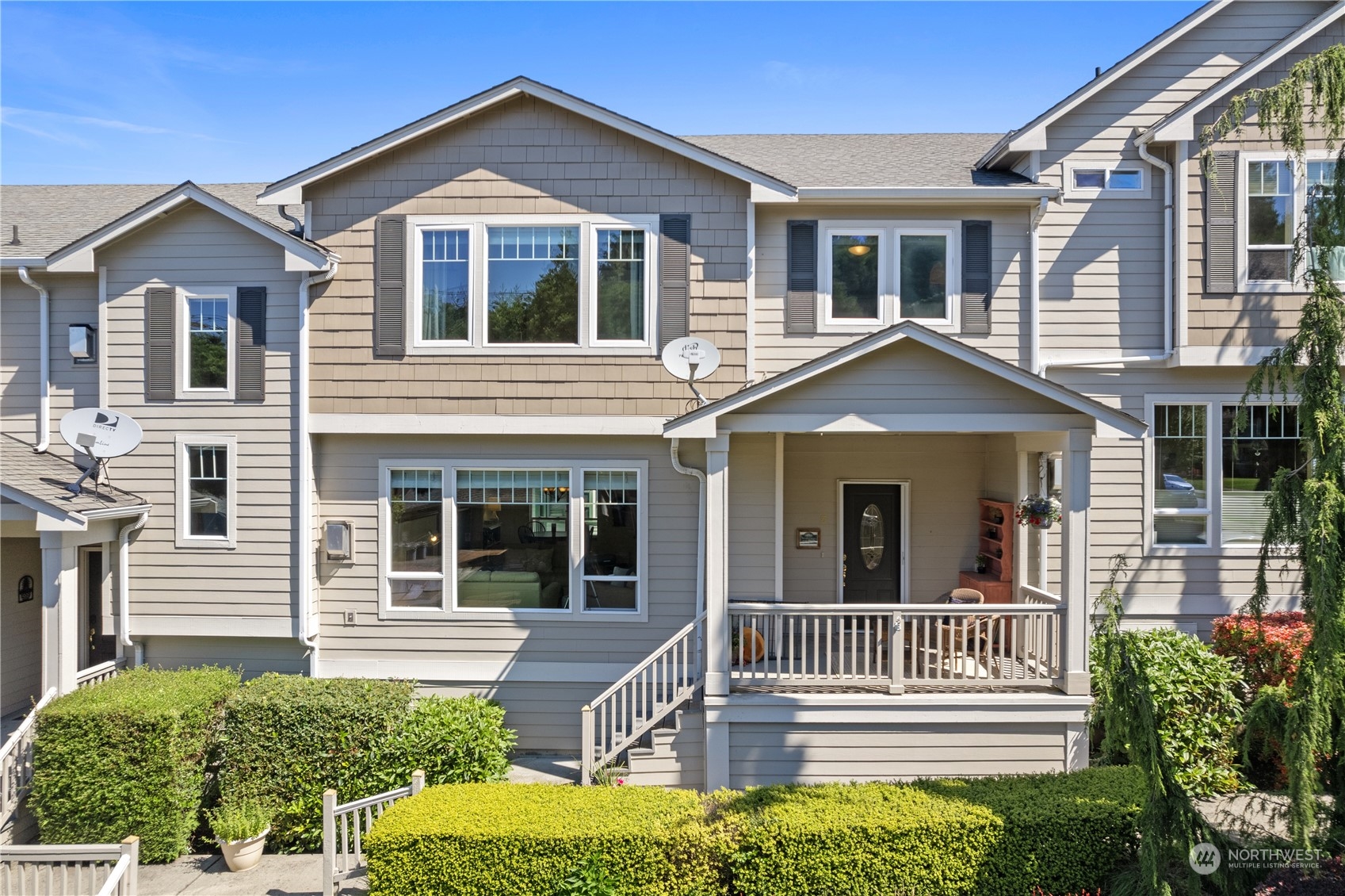 2030 Rucker Avenue, Unit 3 Everett, WA 98201 - Photo 1 of 40 a front view of a house with a yard