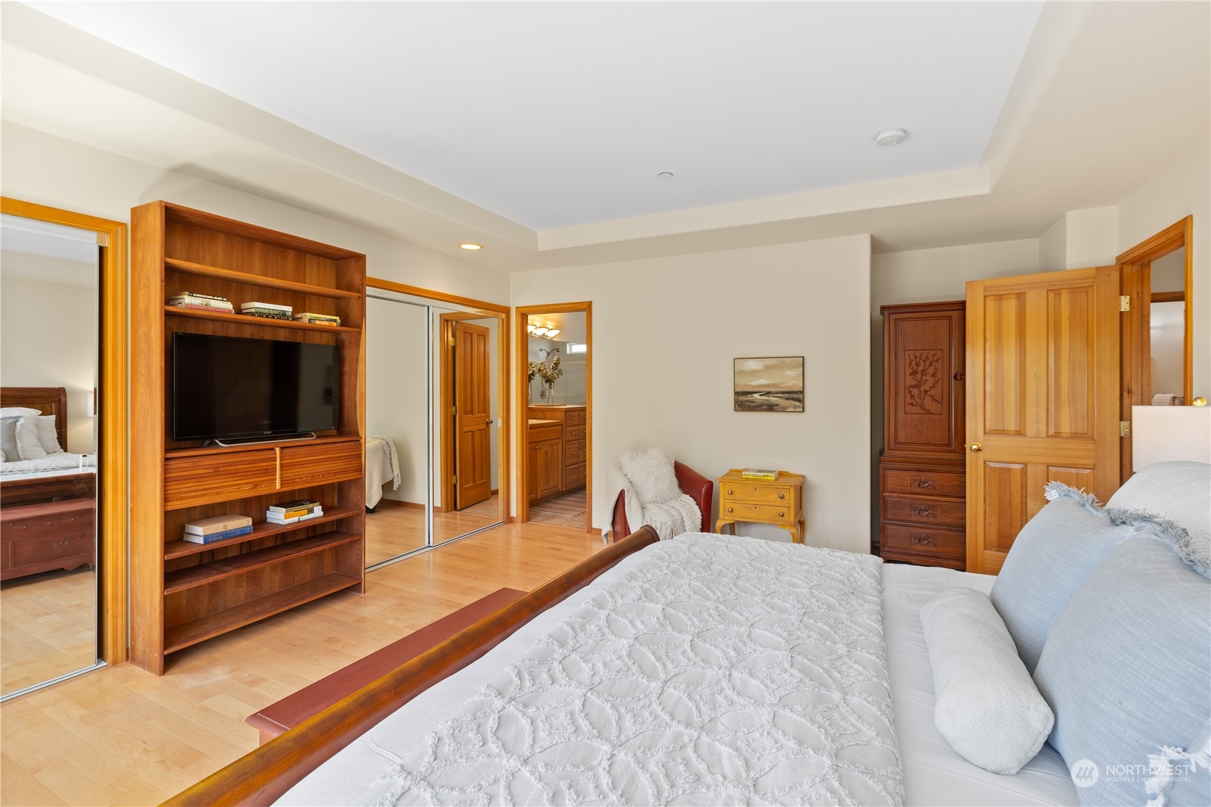 2030 Rucker Avenue, Unit 3 Everett, WA 98201 - Photo 18 of 40 a bedroom with a bed and wooden floor