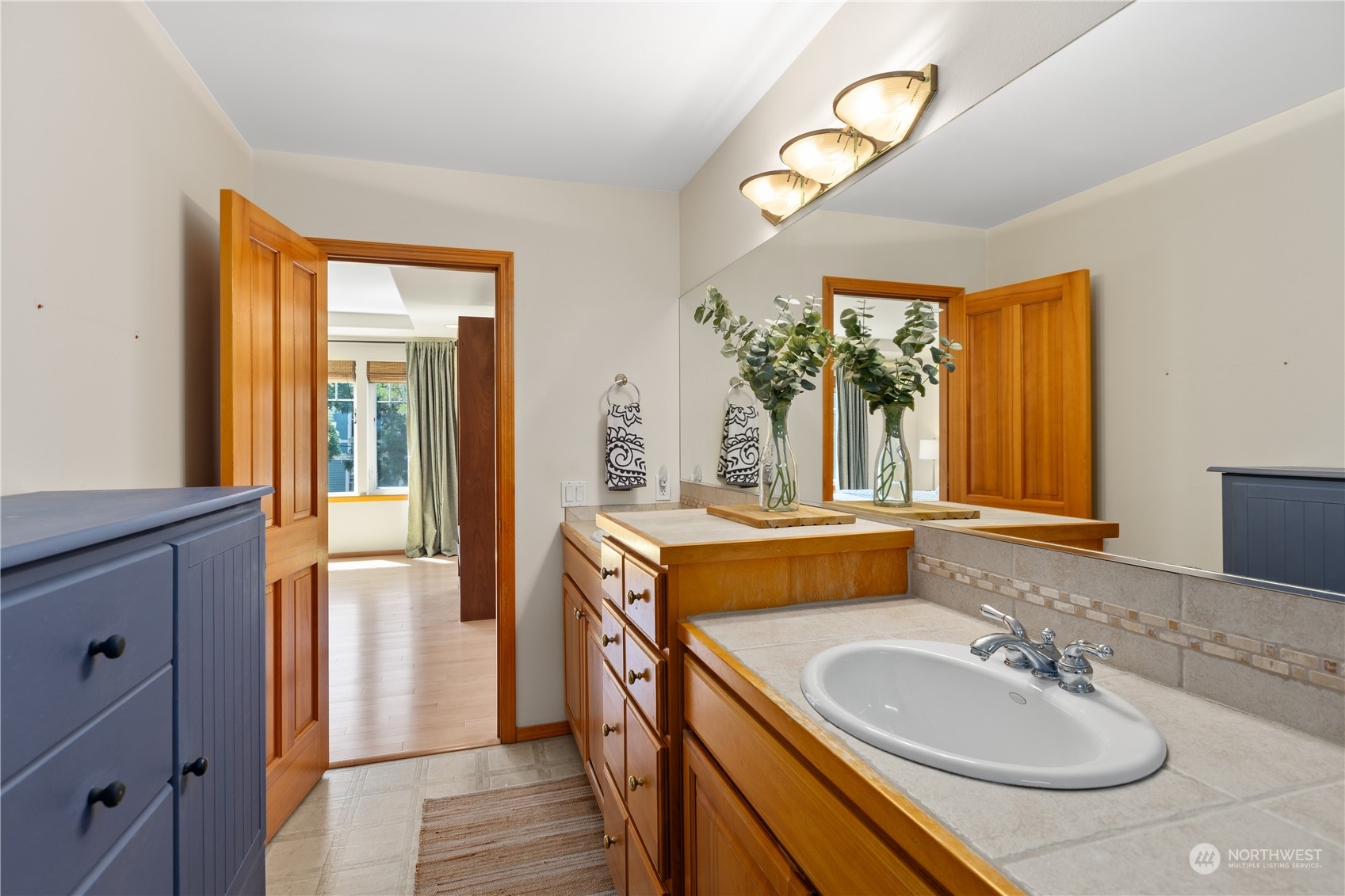 2030 Rucker Avenue, Unit 3 Everett, WA 98201 - Photo 21 of 40 a bathroom with a sink and a mirror