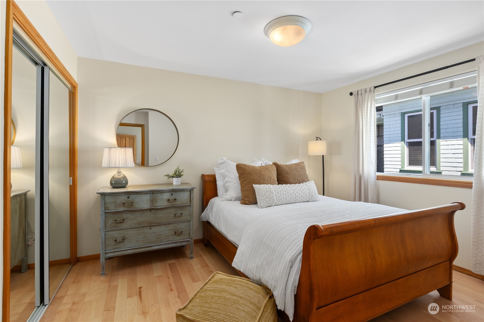 2030 Rucker Avenue, Unit 3 Everett, WA 98201 - Photo 22 of 40 a bedroom with a bed and a dresser