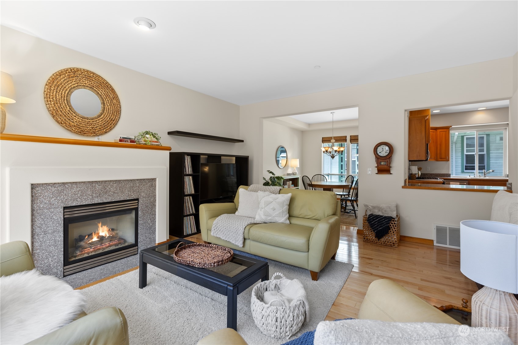 2030 Rucker Avenue, Unit 3 Everett, WA 98201 - Photo 6 of 40 a living room with furniture a rug and a fireplace