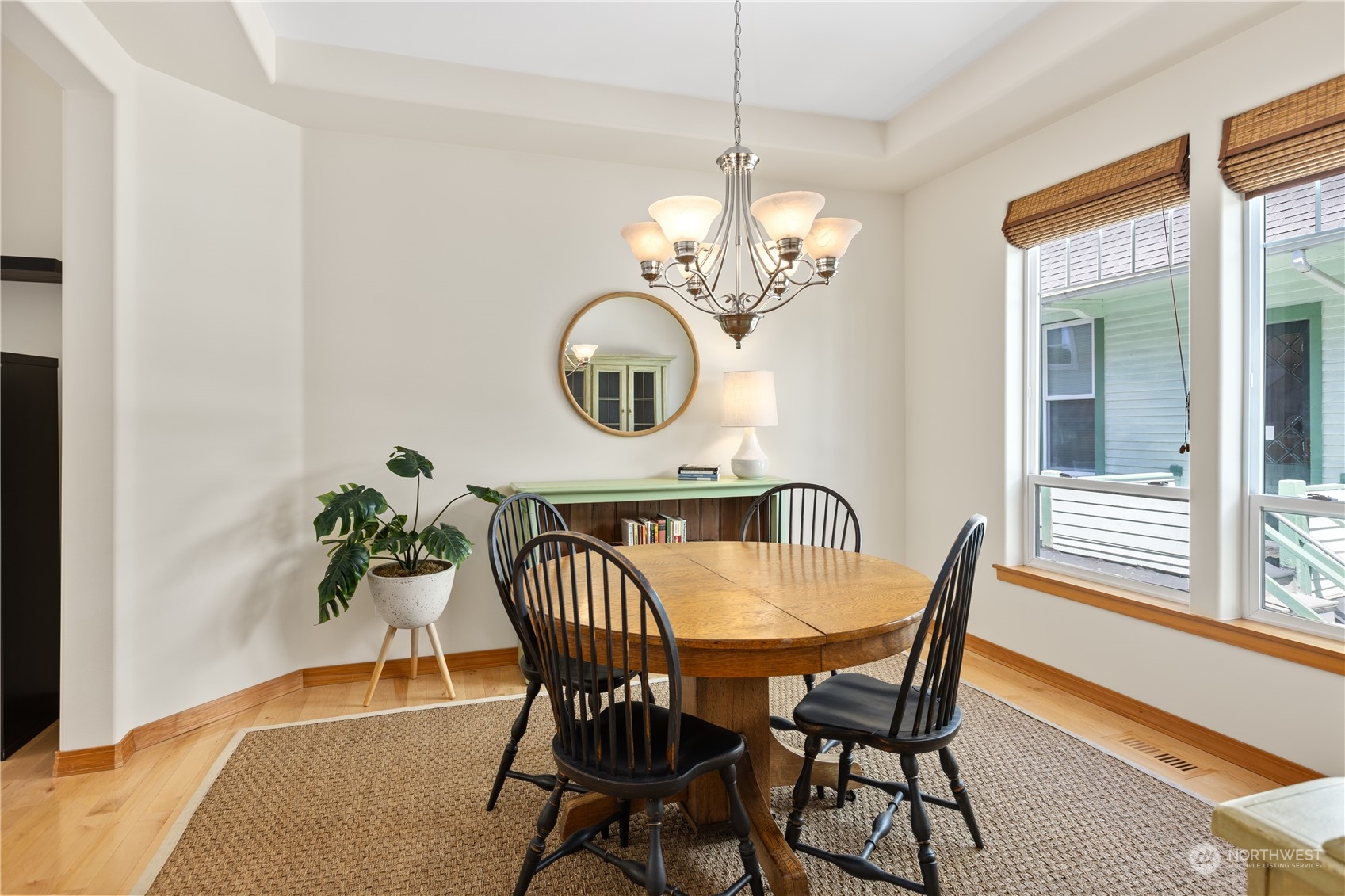 2030 Rucker Avenue, Unit 3 Everett, WA 98201 - Photo 10 of 40 a view of a dining room with furniture wooden floor and chandelier