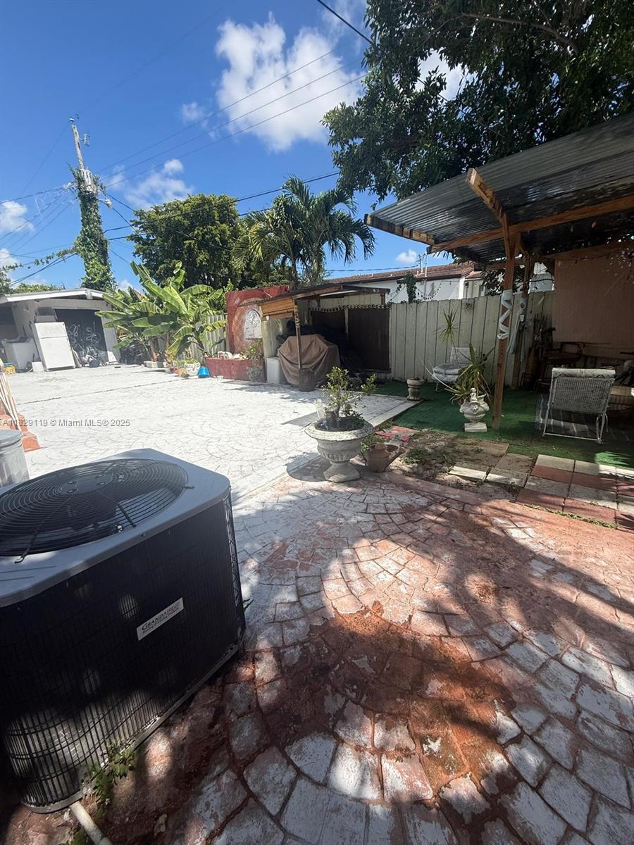 7900 Southwest 21st Terrace Miami, FL 33155 - Photo 17 of 19 a view of a backyard with sitting area