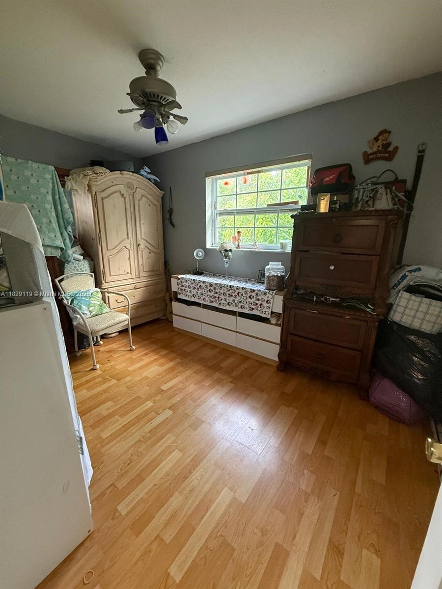 7900 Southwest 21st Terrace Miami, FL 33155 - Photo 7 of 19 a living room with furniture and a window