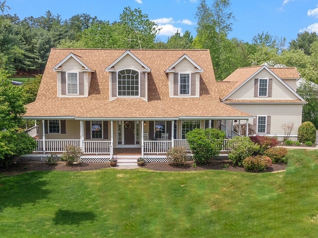 2 Gullane Road Hooksett, NH 03106 - Photo 1 of 27 a front view of a house with a yard