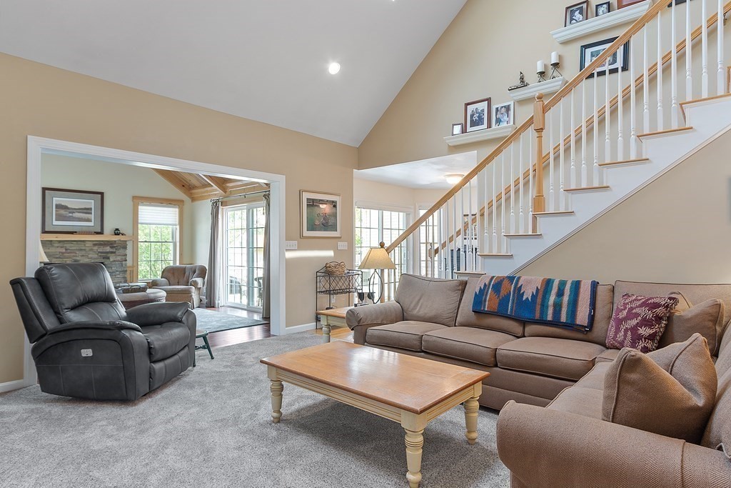 2 Gullane Road Hooksett, NH 03106 - Photo 13 of 27 a living room with furniture and a wooden floor