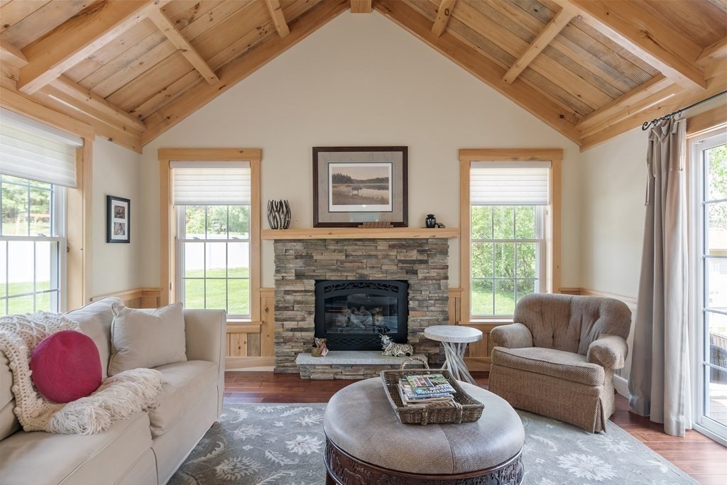 2 Gullane Road Hooksett, NH 03106 - Photo 15 of 27 a living room with furniture and a fireplace