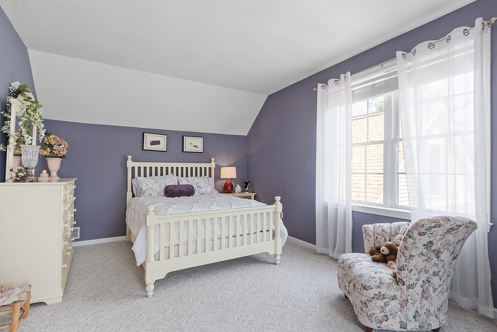 2 Gullane Road Hooksett, NH 03106 - Photo 20 of 27 a bedroom with a bed and a couch