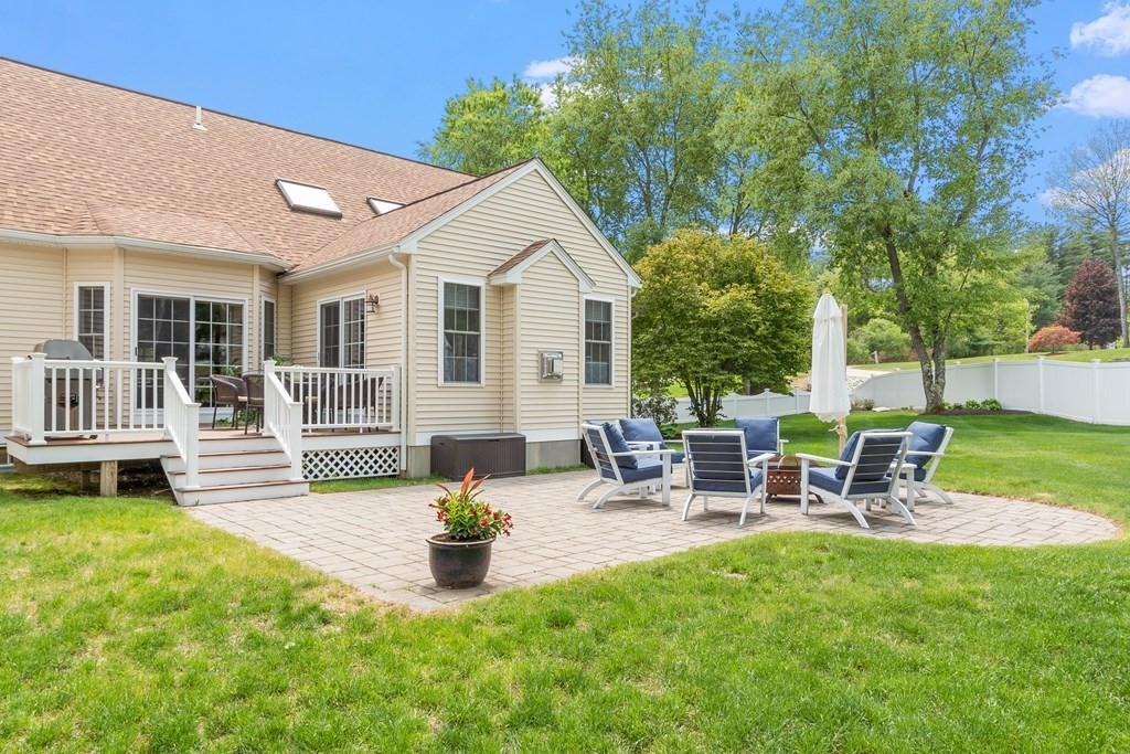 2 Gullane Road Hooksett, NH 03106 - Photo 25 of 27 a view of a house with backyard and sitting area