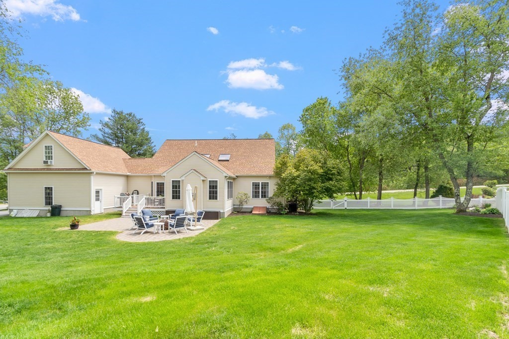 2 Gullane Road Hooksett, NH 03106 - Photo 26 of 27 a view of a house with a yard and sitting area