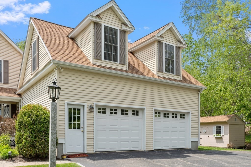 2 Gullane Road Hooksett, NH 03106 - Photo 5 of 27 a front view of a house with a garage