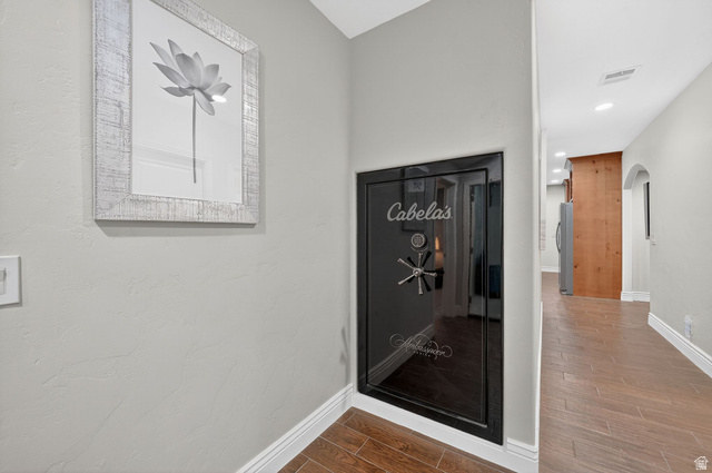 14738 Tangle Hill Road Herriman, UT 84096 - Photo 51 of 66 Built-in wall safe featuring a black finish and chrome-tone hardware