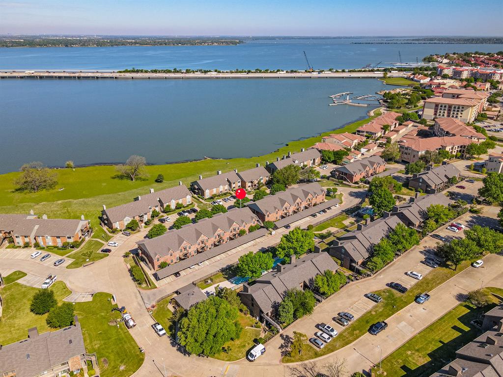 1871 Signal Ridge Place Rockwall, TX 75032 - Photo 25 of 26 a view of a lake with a table and chairs