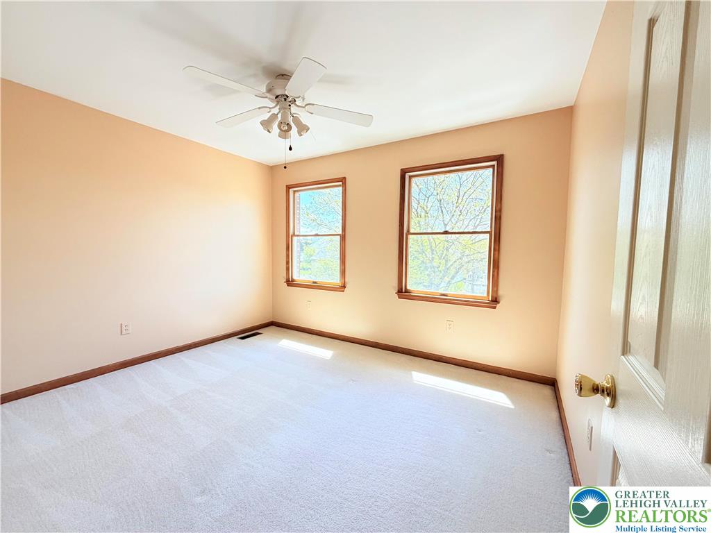 4165 Alder Road Bethlehem, PA 18020 - Photo 25 of 42 an empty room with windows and fan