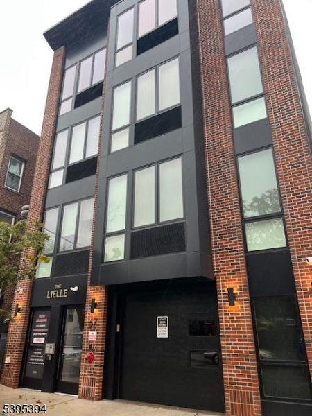 67 Summer Avenue, Unit 202 Newark, NJ 07104 - Photo 26 of 26 a front view of a building