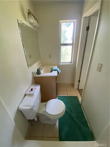 a bathroom with a shower and a toilet