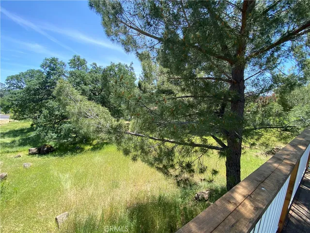 a view of a balcony with an outdoor space