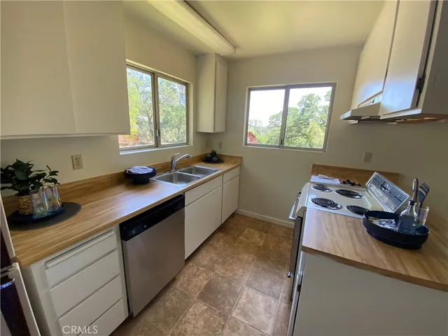a view of empty room with windows